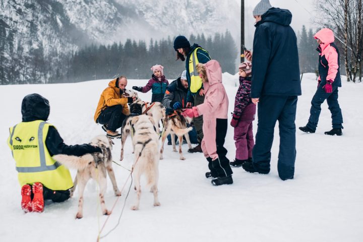 a group of people that are standing in the snow