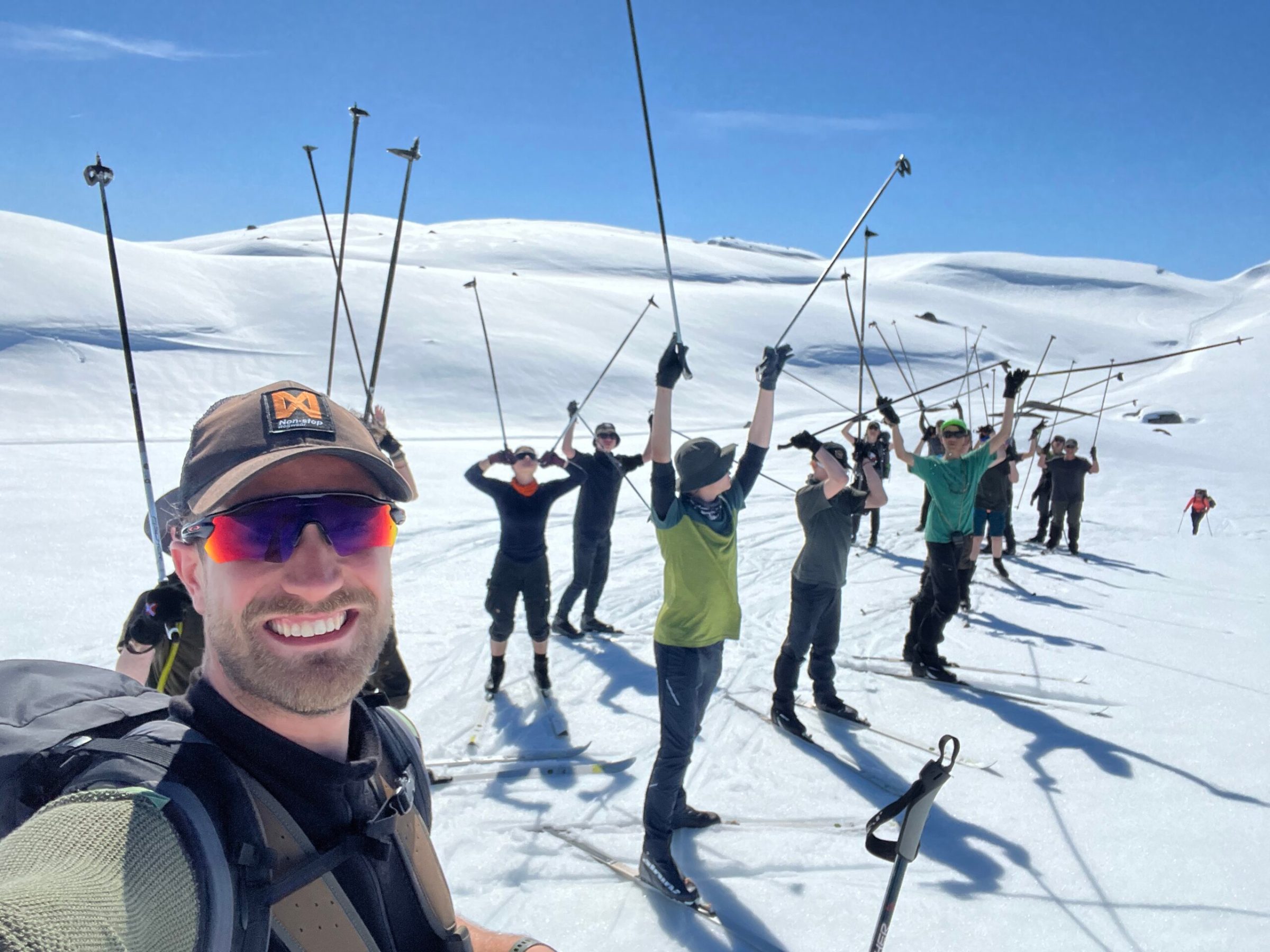 a group of people that are skiing in the snow