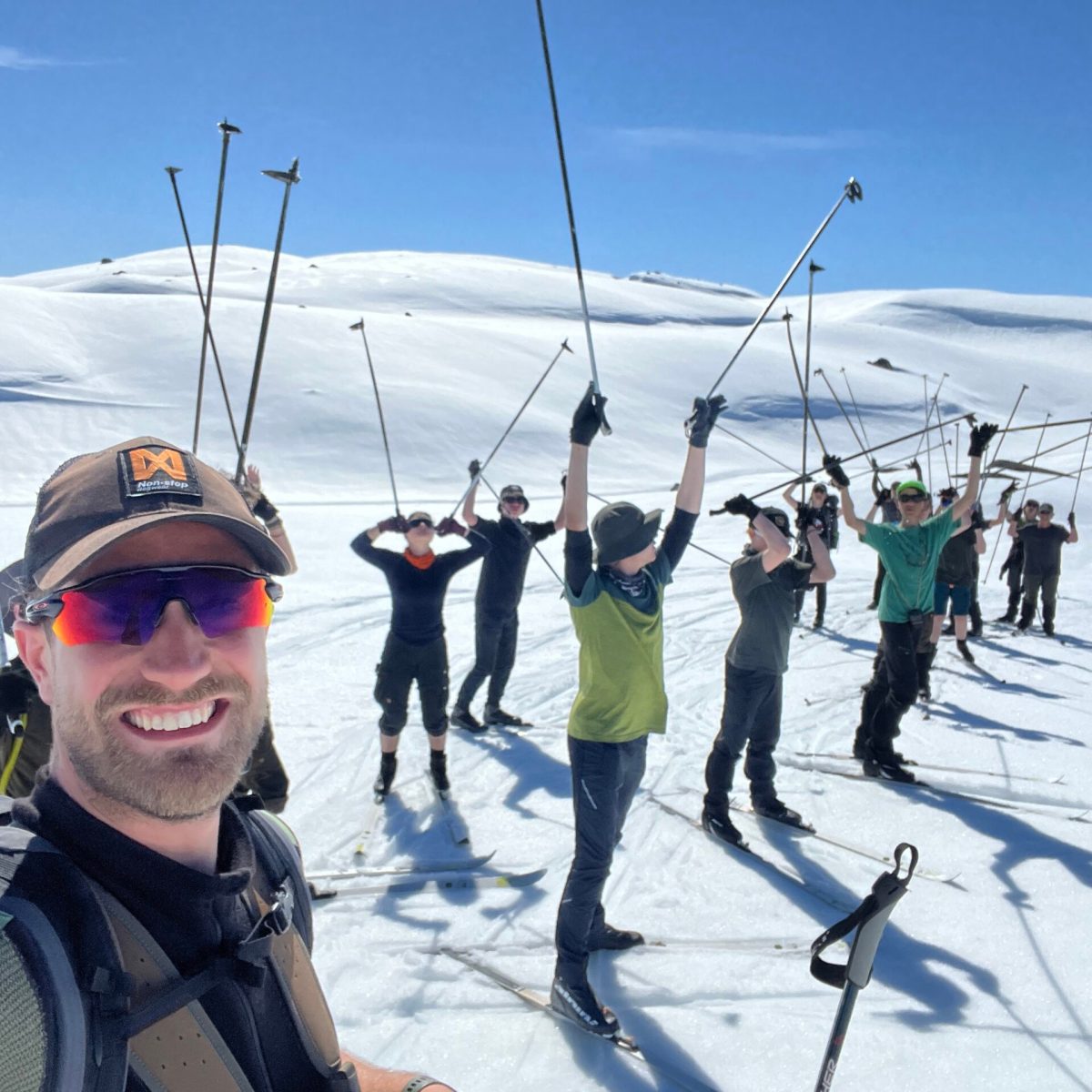 a group of people that are skiing in the snow